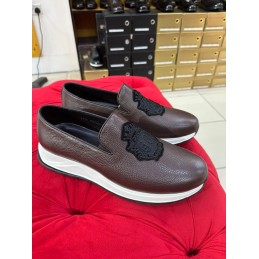 Brown leather slip on sneakers