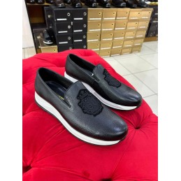 Black leather slip on sneakers