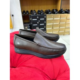 Brown leather black sole...