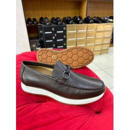 Brown leather white sole...